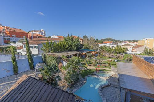 an aerial view of a water slide in a resort at NINHO SALOIO in Venda do Pinheiro