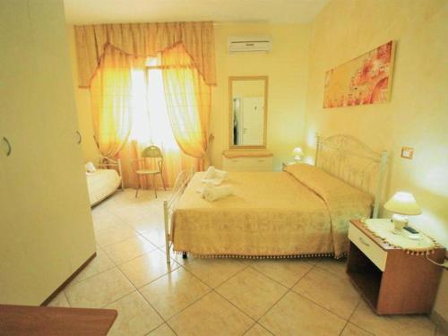 Postel nebo postele na pokoji v ubytování B&B Arcobaleno - Costa