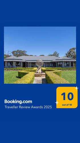 a building with a statue in front of it at Benbullen Retreat in Angaston