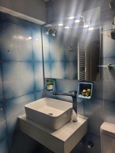 a bathroom with a sink and a mirror at Take me Home country home by "elite" in Éxo Khóra