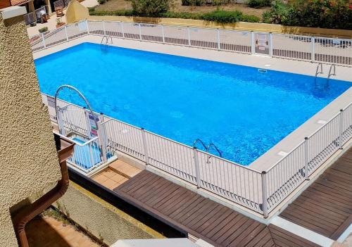 Swimmingpoolen hos eller tæt på Le Quai401 YourHostHelper