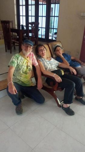a group of three people sitting on a chair at Marigold Negombo in Negombo