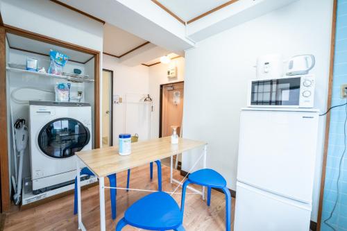 Kaibundo Apartment Hotelにあるキッチンまたは簡易キッチン