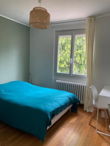 Ένα ή περισσότερα κρεβάτια σε δωμάτιο στο La Boissière