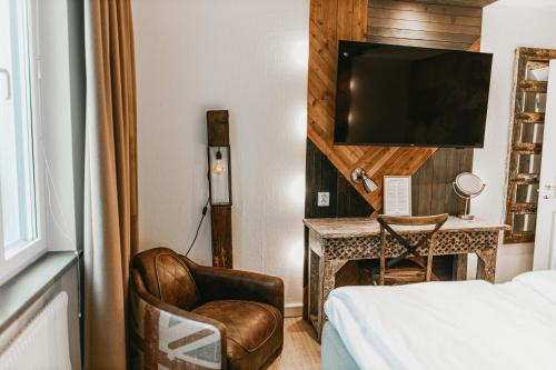 TV a/nebo společenská místnost v ubytování Havshotellet