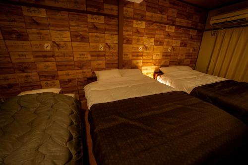 Kaibundo Apartment Hotelにあるベッド