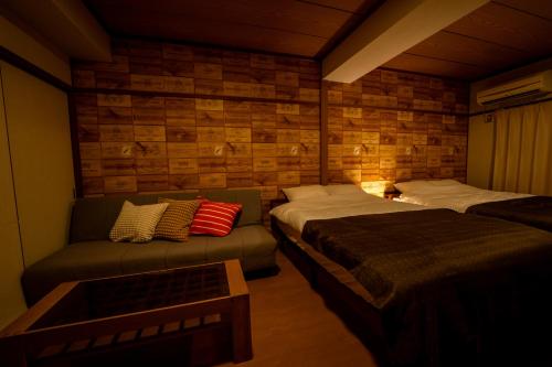 Kaibundo Apartment Hotelにあるベッド