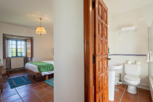 Ένα μπάνιο στο Casa Rectoral entera