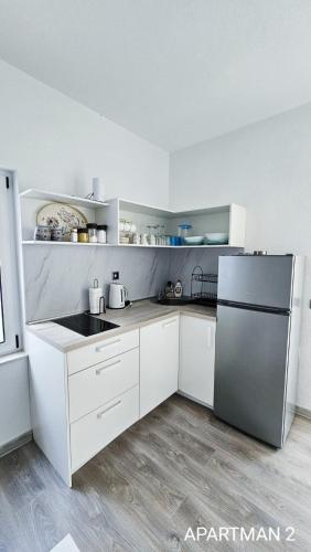 Η κουζίνα ή μικρή κουζίνα στο Apartmani Perić