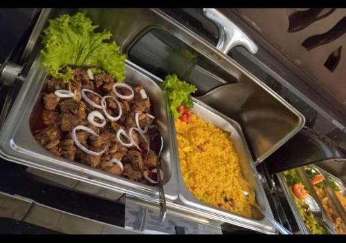 a plastic container filled with different types of food at Lake Hideaway in Panadura