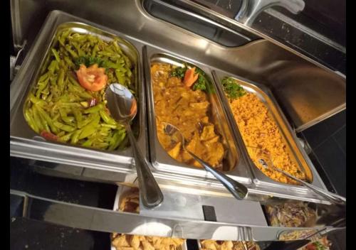 a tray of food with different types of food at Lake Hideaway in Panadura