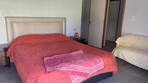 Postel nebo postele na pokoji v ubytování Casa Cortaderas