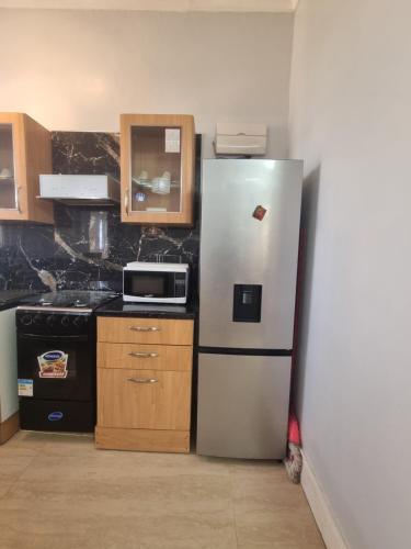 Dapur atau dapur kecil di Legacy Homes