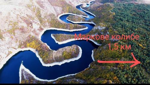 an aerial view of a river with a map of korea at Markove kolibe 5, Uvac, Sjenica in Sjenica