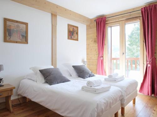 Postel nebo postele na pokoji v ubytování Standing, spa, piscine, pied de pistes, 8 personnes, St-Martin-de-Belleville - FR-1-461-26