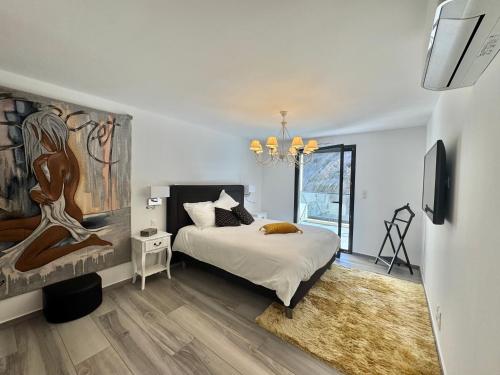 En eller flere senge i et værelse på Fronte di Mare - Grand confort vue mer