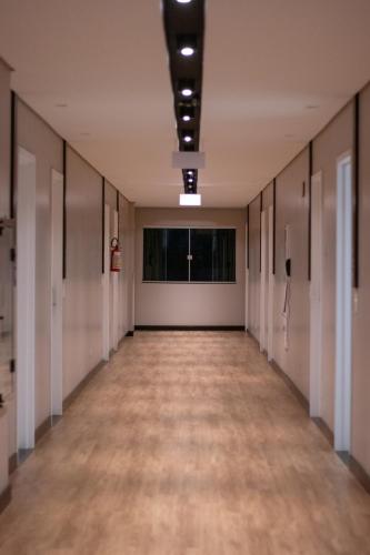 an empty hallway in an office building at Cataratas Park Hotel e Eventos in Foz do Iguaçu