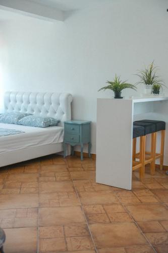 Postel nebo postele na pokoji v ubytování Casa Selimi