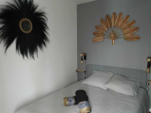 Postel nebo postele na pokoji v ubytování Le Cosy Home