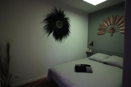 Postel nebo postele na pokoji v ubytování Le Cosy Home
