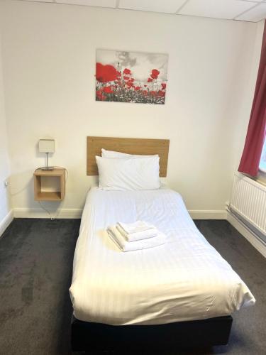 Ein Bett oder Betten in einem Zimmer der Unterkunft Lancaster University