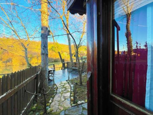 a window of a house with a view of a yard at Paradise Plus Ağva in Agva