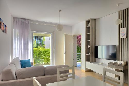 Μια τηλεόραση ή/και κέντρο ψυχαγωγίας στο Sunny Beach Apartments - 126