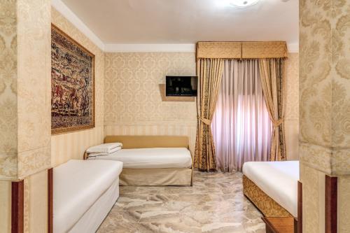 Koupelna v ubytování Hotel Orazia