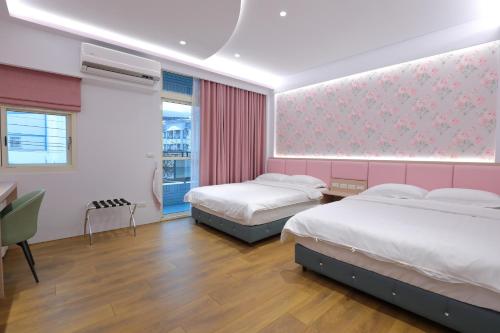 Postel nebo postele na pokoji v ubytování Passion Fruit B&B