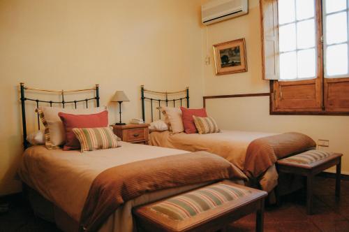 Cama ou camas em um quarto em Robles de Besares