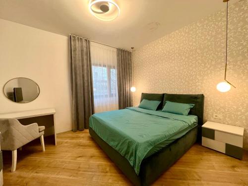 En eller flere senge i et værelse på 4City North Apartament 2 rooms
