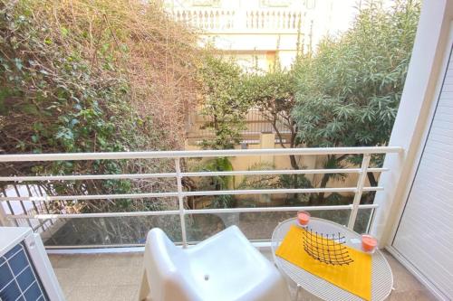 a balcony with a sink and a table at Renovated 2 bedrooms - Boulevard de la Croisette in Cannes