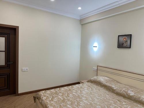 a bedroom with two beds in a room at Serenity Suites in Qusar
