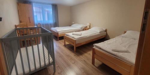 Ένα ή περισσότερα κρεβάτια σε δωμάτιο στο Chałupka Apartament