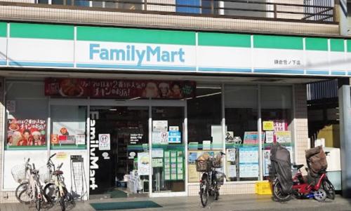 a familymart store with bikes parked outside of it at 一棟貸しの宿 寂香庵 in Kamakura