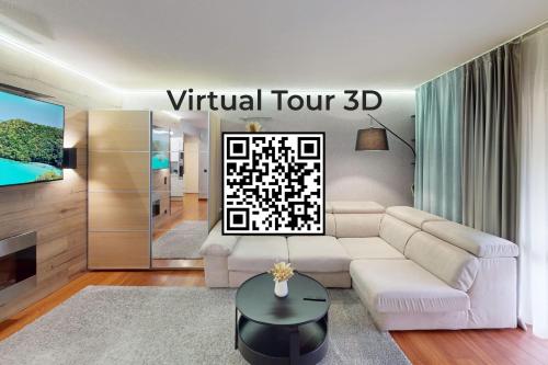 un salon avec un canapé blanc et une télévision dans l'établissement Cozy Apt with Balcony - 5 min to the Beach, à Nice