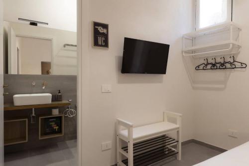 TV a/nebo společenská místnost v ubytování Mariù Loft & Apartments