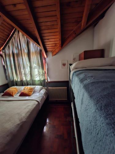 Postel nebo postele na pokoji v ubytování Why Not Guemes