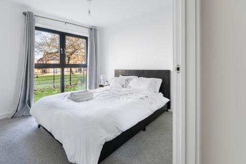 Katil atau katil-katil dalam bilik di Modern Flat in Central Derby