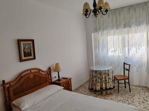 Un pat sau paturi într-o cameră la Casa Nijar