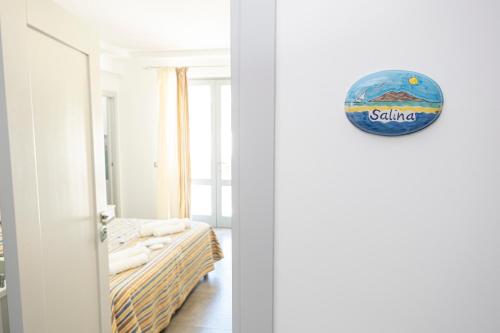 Postel nebo postele na pokoji v ubytování APPARTAMENTI IL VENTAGLIO