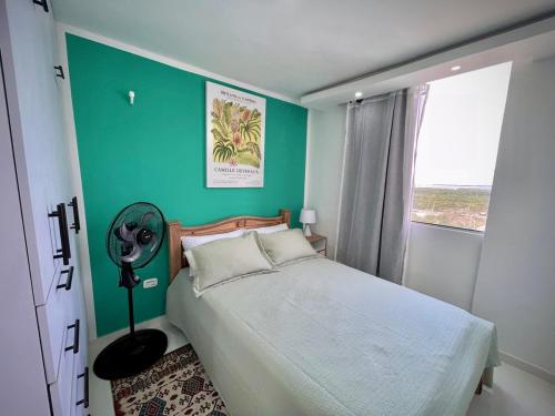 Postel nebo postele na pokoji v ubytování Apartamento con vista única cerca de la Uninorte