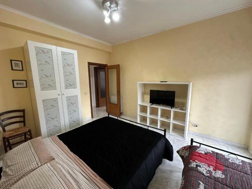 A bed or beds in a room at La casa del sole