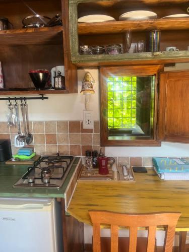 a kitchen with a stove and a counter top at Monte Paradiso Agriturismo in Pietralunga