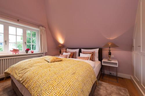 Postel nebo postele na pokoji v ubytování Meln Hüs