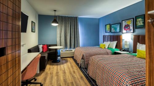 Postel nebo postele na pokoji v ubytování Uptown Suites Extended Stay Austin TX - Round Rock