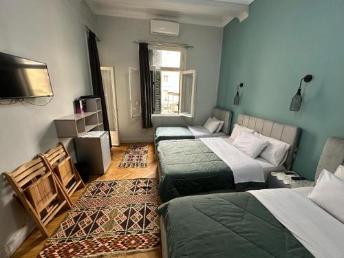 Postel nebo postele na pokoji v ubytování Cheers Hostel Cairo