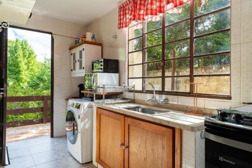 Una cocina o cocineta en Jd Embaixador, 3Q, 5min Paque Capivari