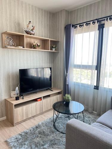 Μια τηλεόραση ή/και κέντρο ψυχαγωγίας στο Escent condo Chiangmai nineteen