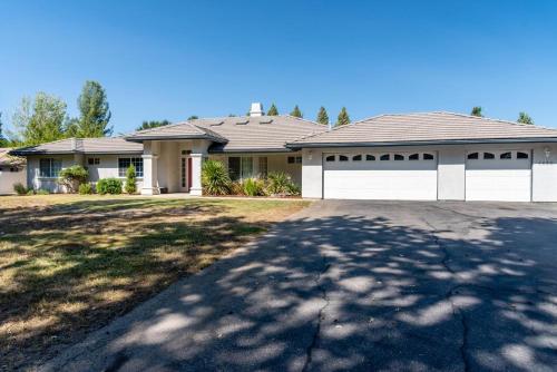 a house with a large driveway in front of it at Sea Rock Ranch in Templeton